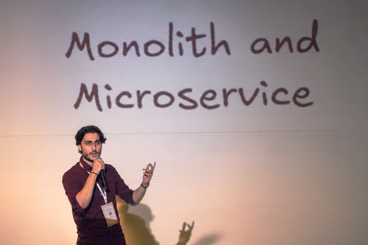 Mohammad Zbib speaking at GDG DevFest Beirut on microservices